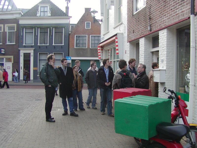The group is entering the Italian restaurant.